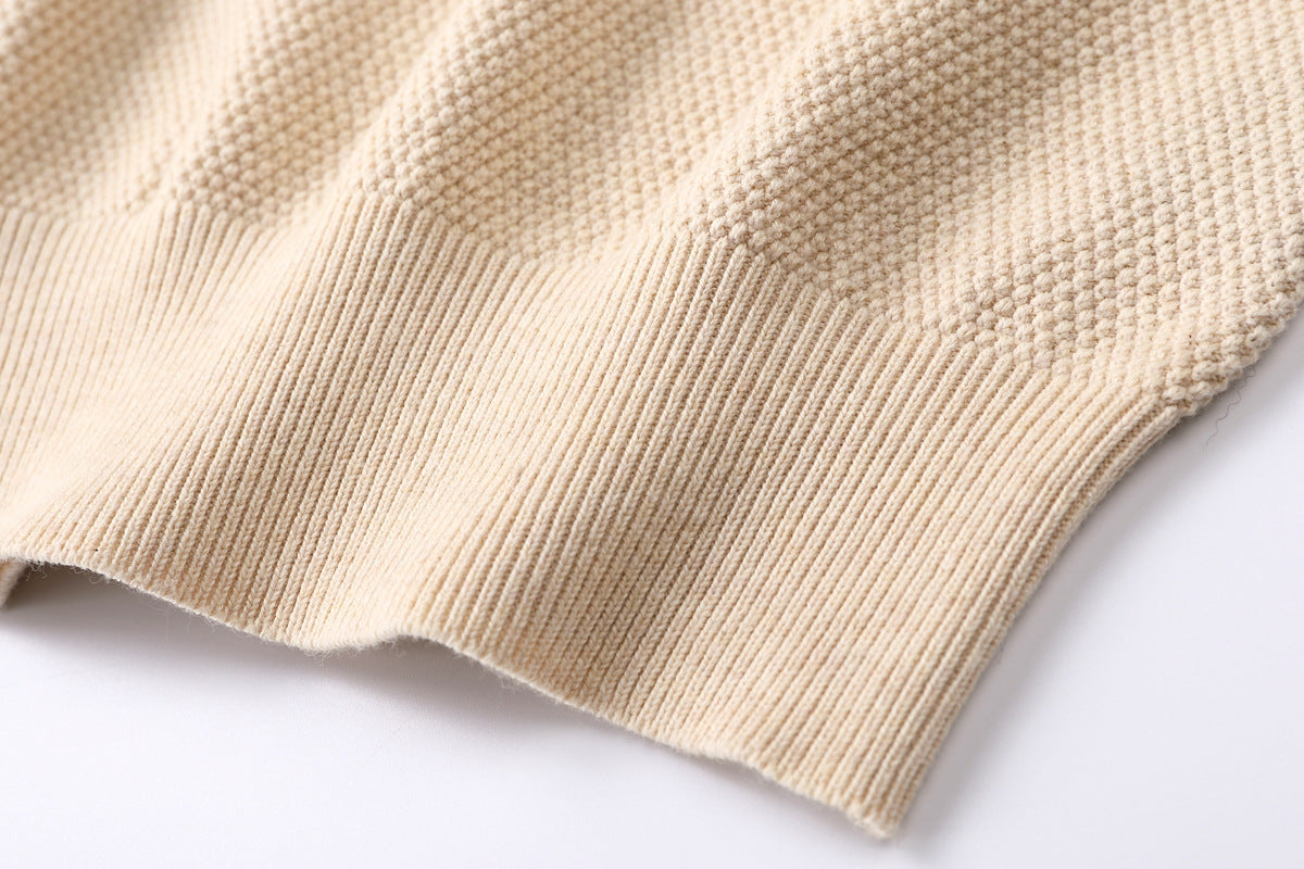 Close up of Brown cardigan on a white background
