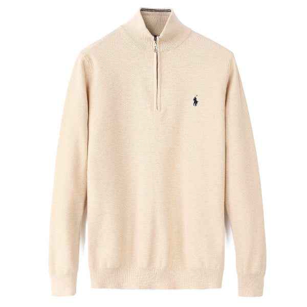 Cream Beige sweater with a small logo on a white background