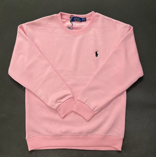 Pink sweatshirt with a brand logo on a black background