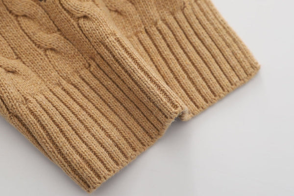 Close up of Brown cardigan on white background