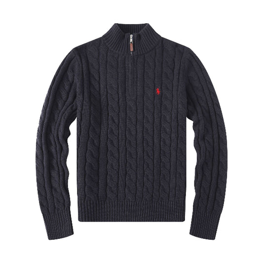 Navy cable knit sweater with a red logo on a white background