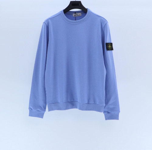 Light blue sweatshirt with a patch on a light gray background