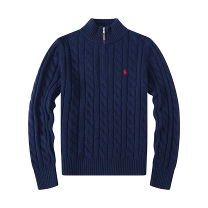 Navy blue cable knit sweater with a red logo on a white background